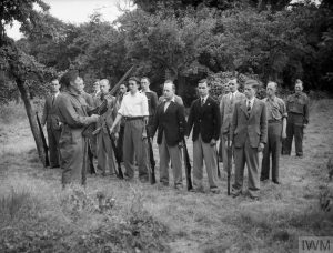 THE HOME GUARD IN THE SECOND WORLD WAR (H 2007) Local Defence Volunteer (LDV) recruits learning rifle drill at Buckhurst Hill, Essex, 1 July 1940. Copyright: © IWM. Original Source: http://www.iwm.org.uk/collections/item/object/205197199