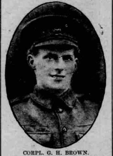 Newspaper image of WWI Soldier smiling and in uniform.